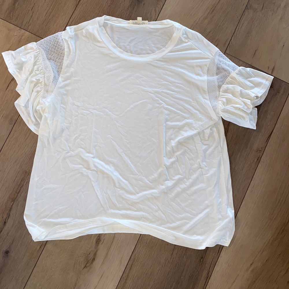 white/cream tee with ruffle sleeves